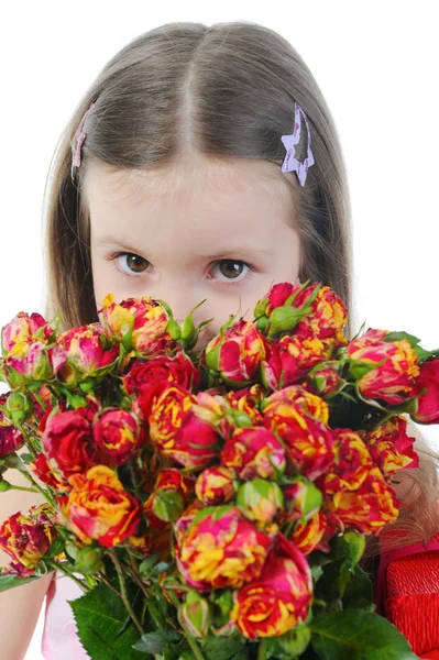 Bambina con una rosa . — Foto Stock