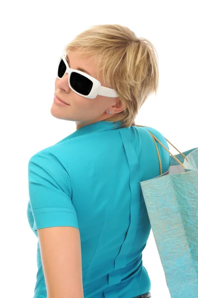 Okouzlující blondýna s nákupní taškou — Stock fotografie