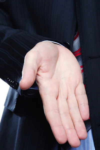 A businessman with an open hand — Stock Photo, Image