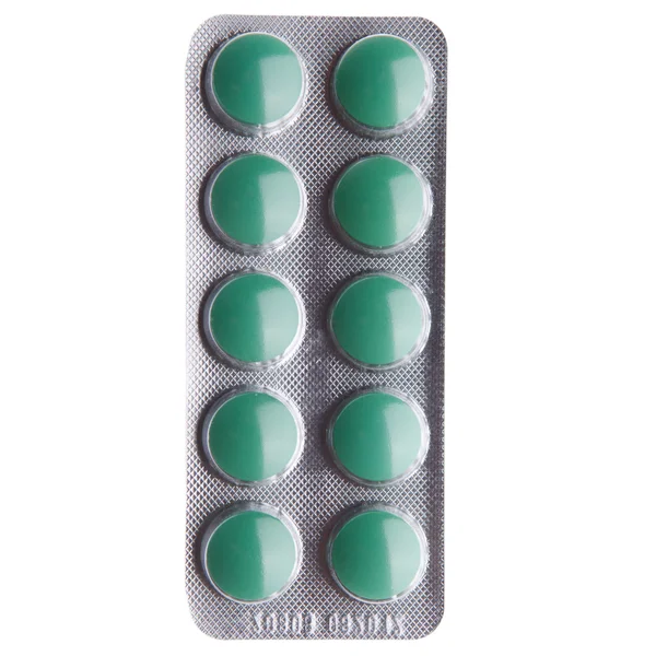 Macro de pílulas isoladas em fundo branco — Fotografia de Stock