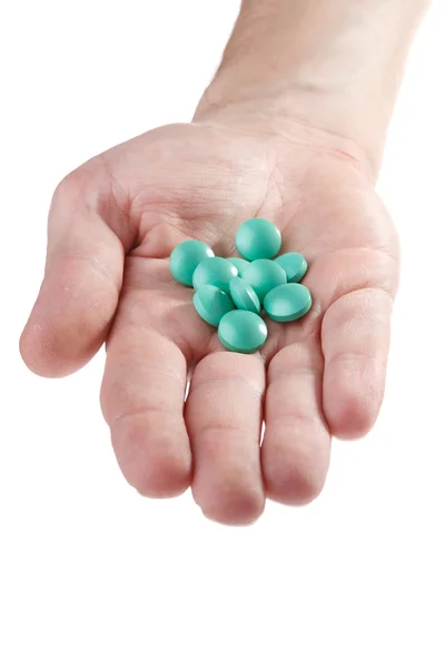 stock image Medical pills in hand close-up on white