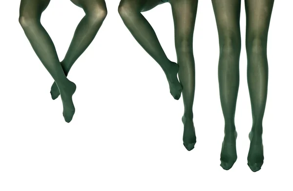 Estudio foto de las piernas femeninas en medias de colores — Foto de Stock