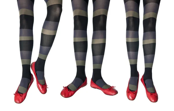 Estudio foto de las piernas femeninas en medias de colores — Foto de Stock