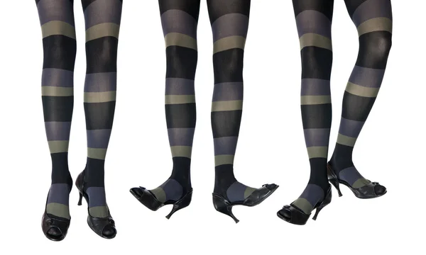 Studiofoto der weiblichen Beine in bunten Strumpfhosen — Stockfoto