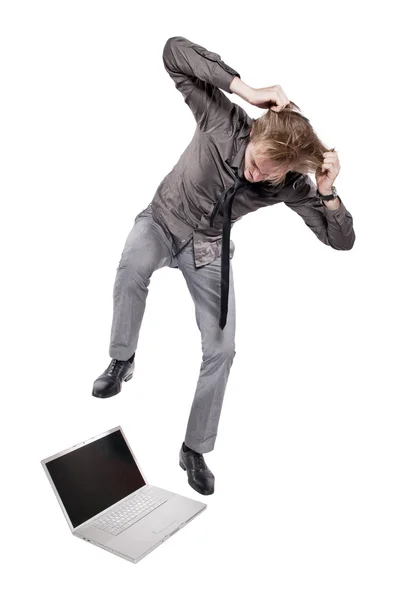 Young Angry Man Destroys Computer Studio Photo White Background — Stock Photo, Image