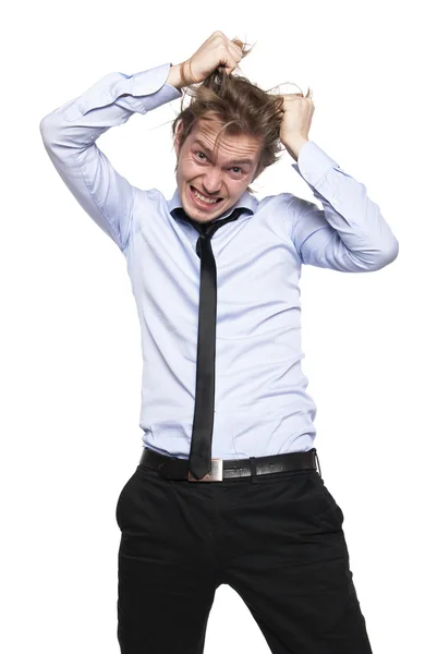 Young man so angry that he wants to pull his hair out — Stock Photo, Image