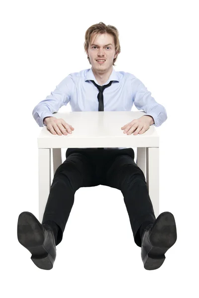 Young Businessman Office Worker Student Sitting Funny Small Table Studio — Stock Photo, Image