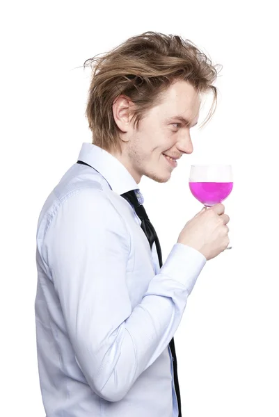 stock image Young man drink pink wine.