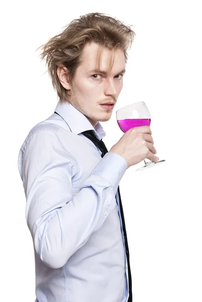 stock image Young man drink pink wine.