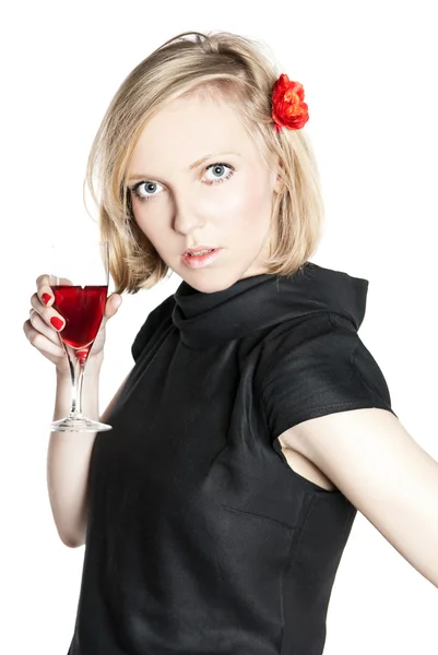 stock image Young attractive woman holding a glass of red wine