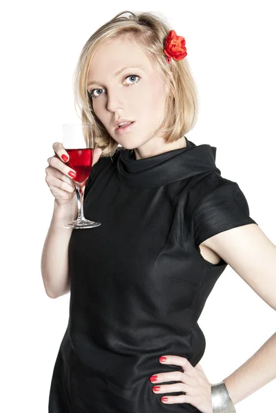 stock image Young attractive woman holding a glass of red wine