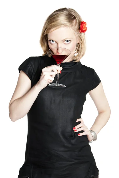 Young attractive woman holding a glass of red wine — Stock Photo, Image