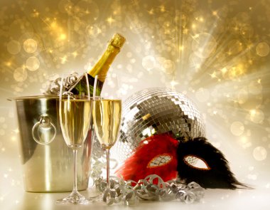 Two glasses of champagne against festive gold background clipart