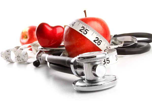 Stethoskop Mit Roten Äpfeln Auf Weißem Hintergrund — Stockfoto