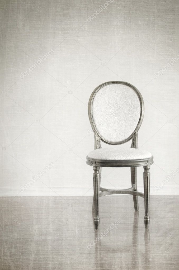 Antique chair with grunge style background