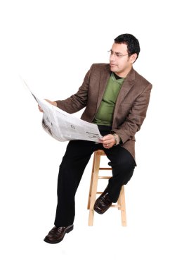 Man reading newspaper. clipart