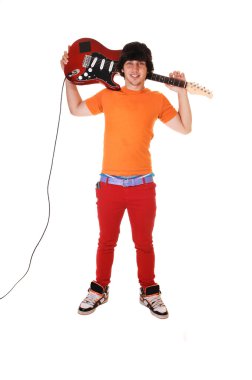 Teen boy with guitar. clipart