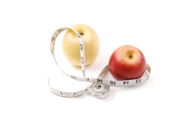 stock image Apple and measuring tape.