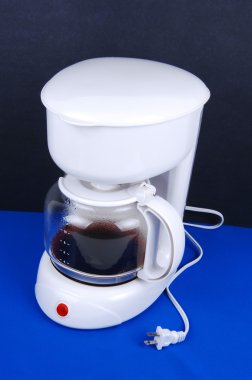 A white coffee maker. clipart