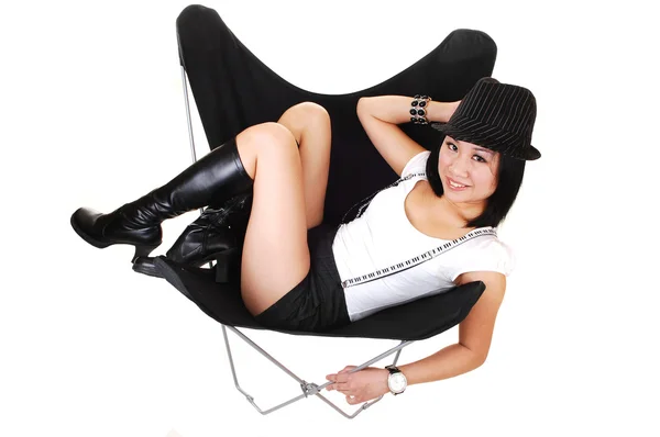 Pretty Chinese Woman Shorts Boots Hat Sitting Black Butterfly Chair — Stock Photo, Image