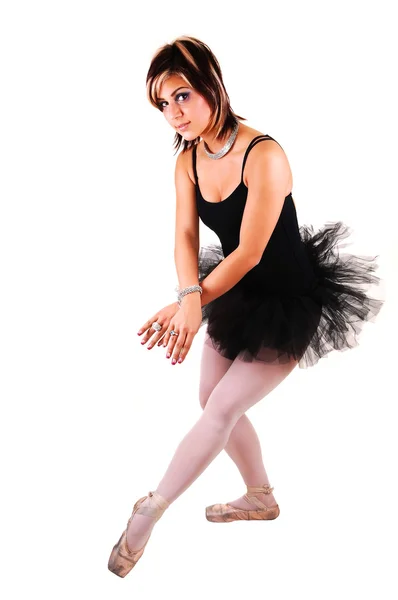 可爱的 漂亮的年轻的芭蕾舞演员的黑色斜纹裙与白色连裤袜舞蹈工作室为白色背景 — 图库照片