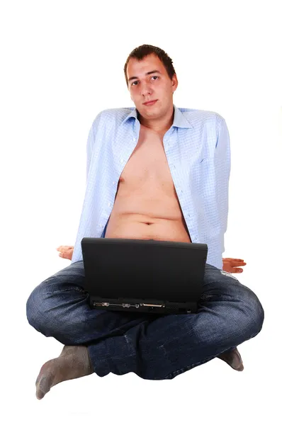 Teen with laptop and open shirt. — Stock Photo, Image