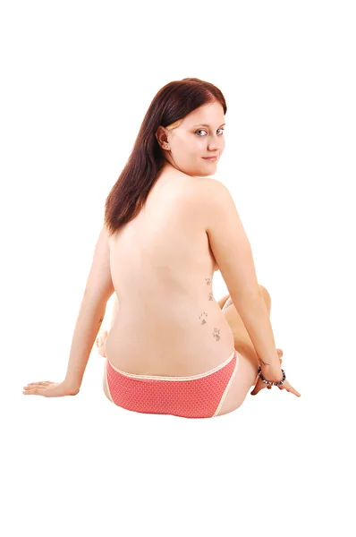 Uma Linda Menina Calcinha Rosa Sentada Chão Topless Com Tatuagem — Fotografia de Stock