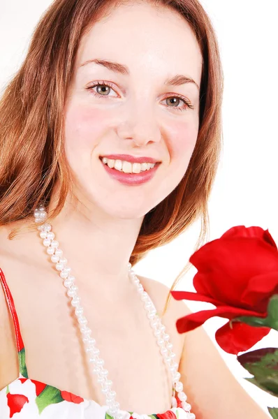 Mooie vrouw met rood, rose. — Stockfoto