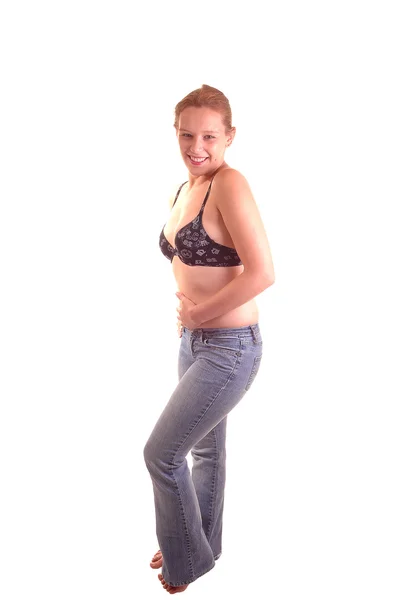 Uma Jovem Mulher Bonita Jeans Sutiã Preto Estúdio Para Fundo — Fotografia de Stock