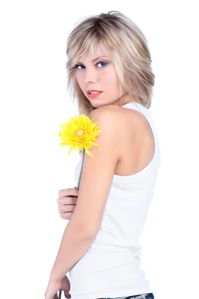 Молода дівчина з квіткою — стокове фото
