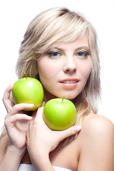 Jong meisje met appels — Stockfoto