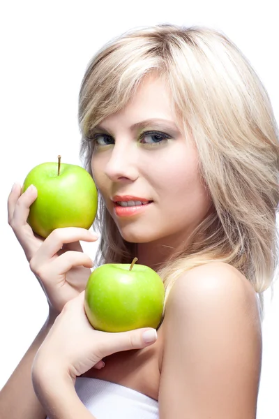 Ung flicka med äpplen — Stockfoto