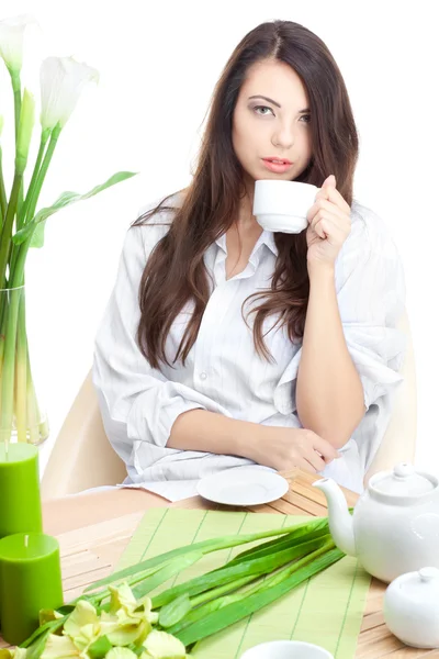 Женщина с чашкой кофе — стоковое фото