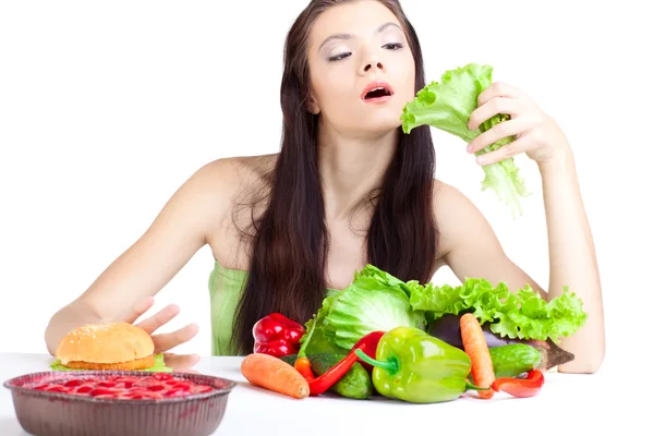 Young girl with vegetables Stock Image