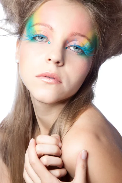 Mooie vrouw met kleur make-up — Stockfoto
