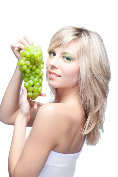 Молода дівчина з виноградом — стокове фото