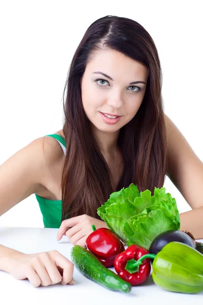 Young girl with vegetables Royalty Free Stock Photos