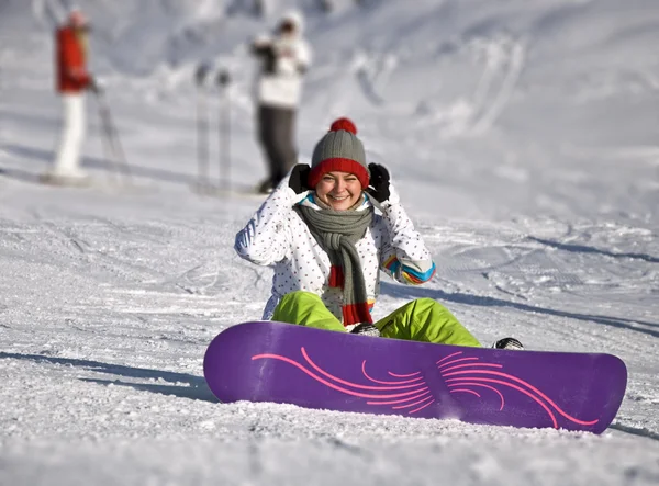 stock image Beautiful woman snowboarder