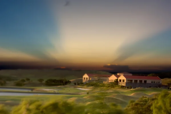 Golf plats med solnedgång — Stockfoto
