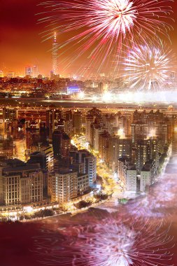 Night view of the taipei city with fireworks clipart