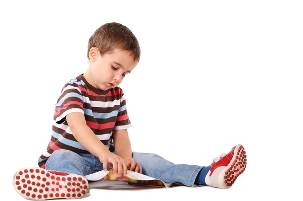 Boy reading magazine — Stock Photo, Image