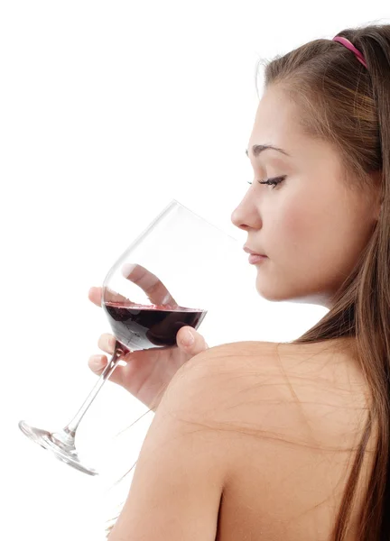 Fiatal nő ízlés bort — Stock Fotó