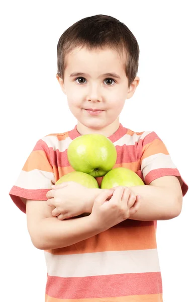 Маленький хлопчик тримає яблука — стокове фото