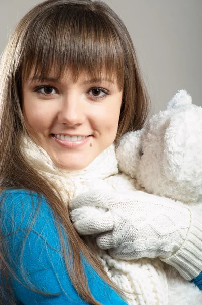 Beautiful winter girl with teddy bear — Stock Photo, Image