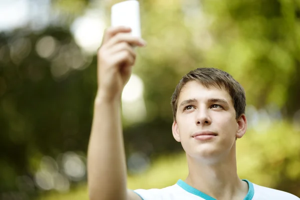 Teen with palmtop — Stock Photo, Image