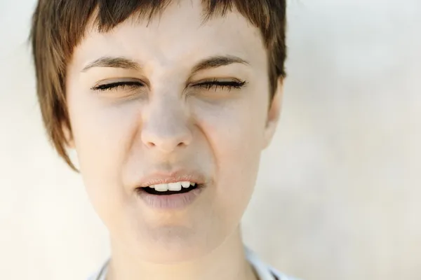 Teenage girl making a face — Stock Photo, Image