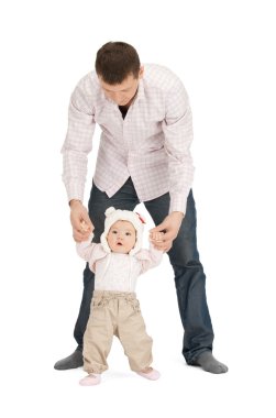 Baby making first steps with father help clipart