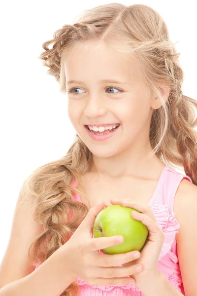 Kleines Mädchen mit grünem Apfel — Stockfoto