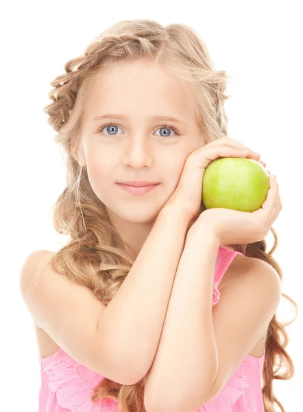 Liten flicka med grönt äpple — Stockfoto