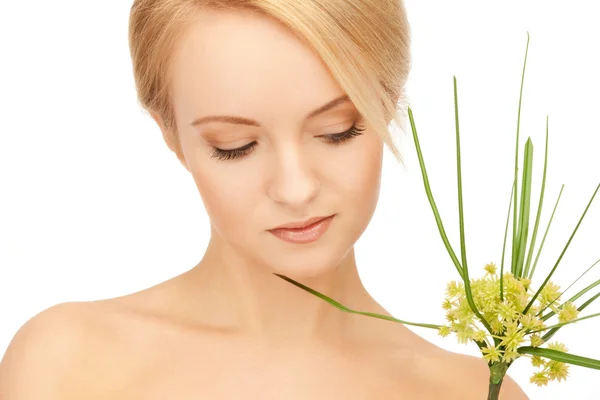 Woman with green sprout — Stock Photo, Image